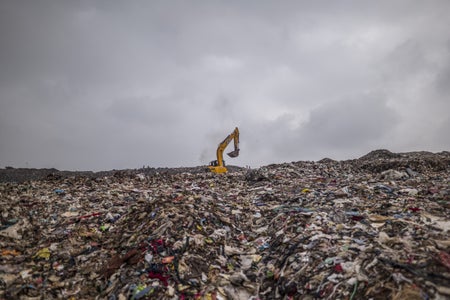 Bulldozer on top of landfill