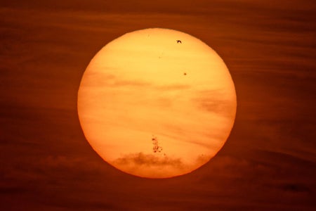 A photograph of the sun, with a large group of sunspots on its face